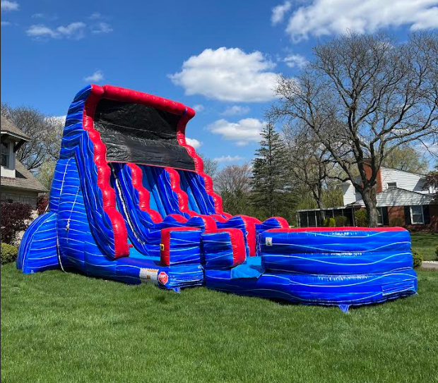 Kids enjoying a bounce house at a party